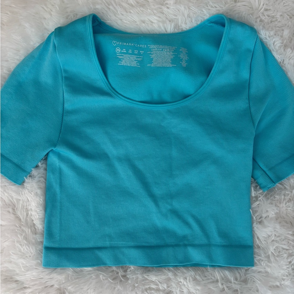 Bright blue top